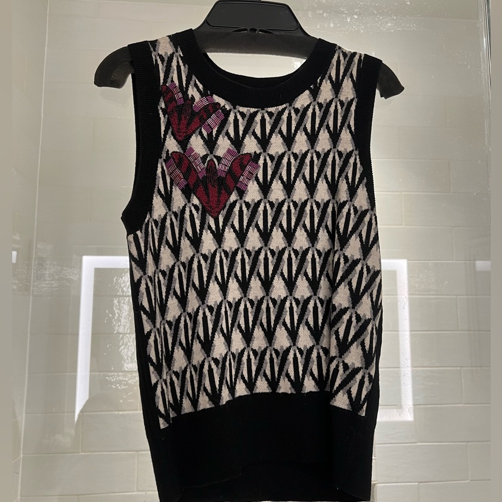 Designer Sleeveless warm Top with Heart Design